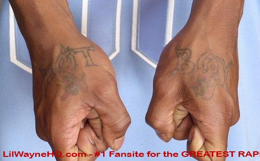 His 'Hot Boys' tattoo on his hands which was the name of the group he used 