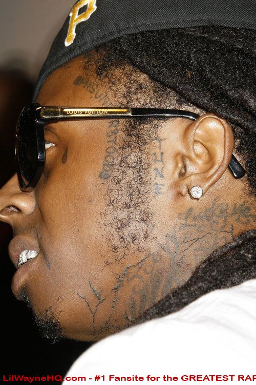 Lil Wayne Tattoos His'Misunderstood''Tune' nickname and'Lucky Me'