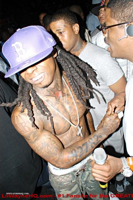 Lil Wayne Tattoos He colored the star below his neck in red which also has 
