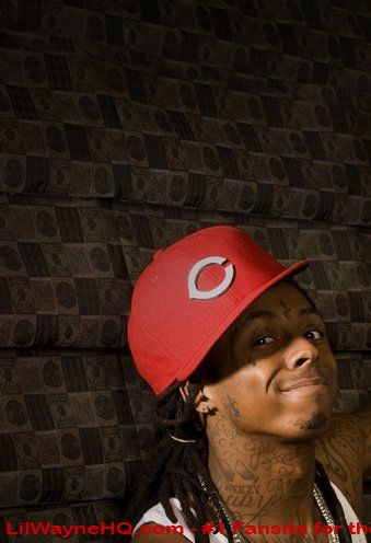 Lil Wayne Neck Tattoos He has a'W' and'Weezy' on the side of his neck