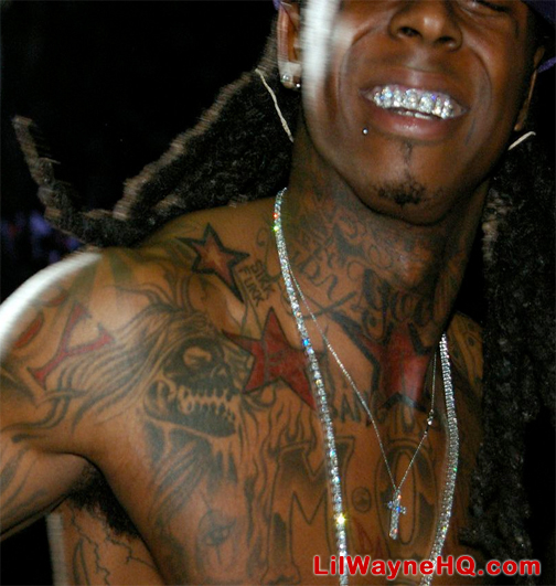 Lil Wayne's neck tattoo proves he's "So Blessed" during a "TRL" taping and