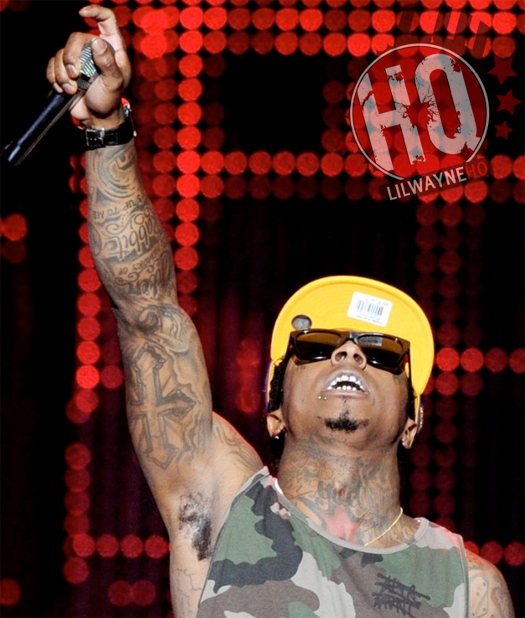 Lil Wayne Cross Bicep Tattoo