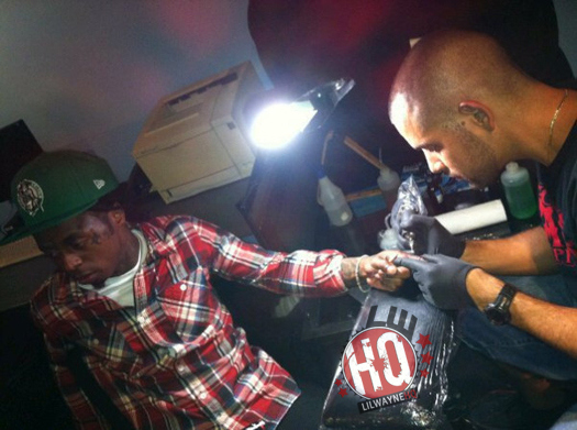 Lil Wayne Getting Tattoo On Finger Here you can see Wayne getting a tattoo 