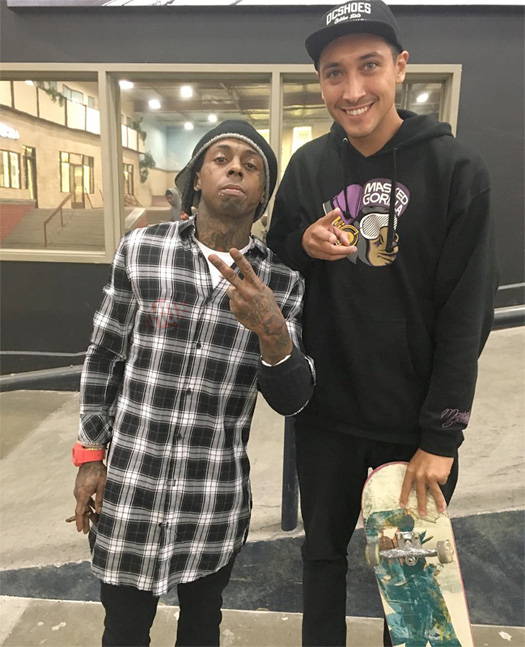 Lil Wayne Bumps “I Am Not A Human Being 2” While Skating At The TRUKSTOP, Crosses Out “CMB” On The “YMCMB” Banner [Video]