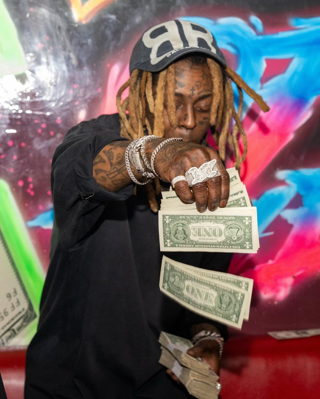 Lil Wayne Makes It Rain At Booby Trap On The River In Miami