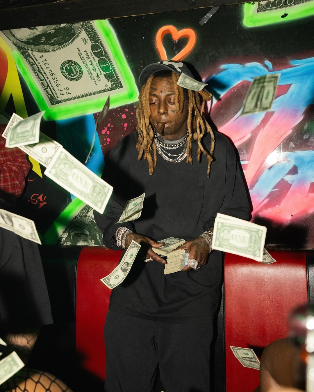 Lil Wayne Makes It Rain At Booby Trap On The River In Miami