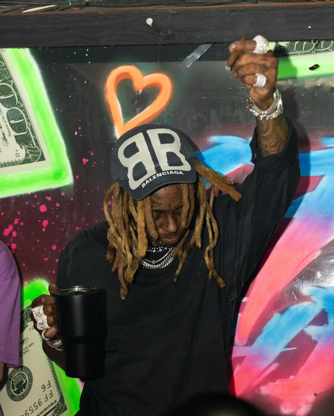 Lil Wayne Makes It Rain At Booby Trap On The River In Miami