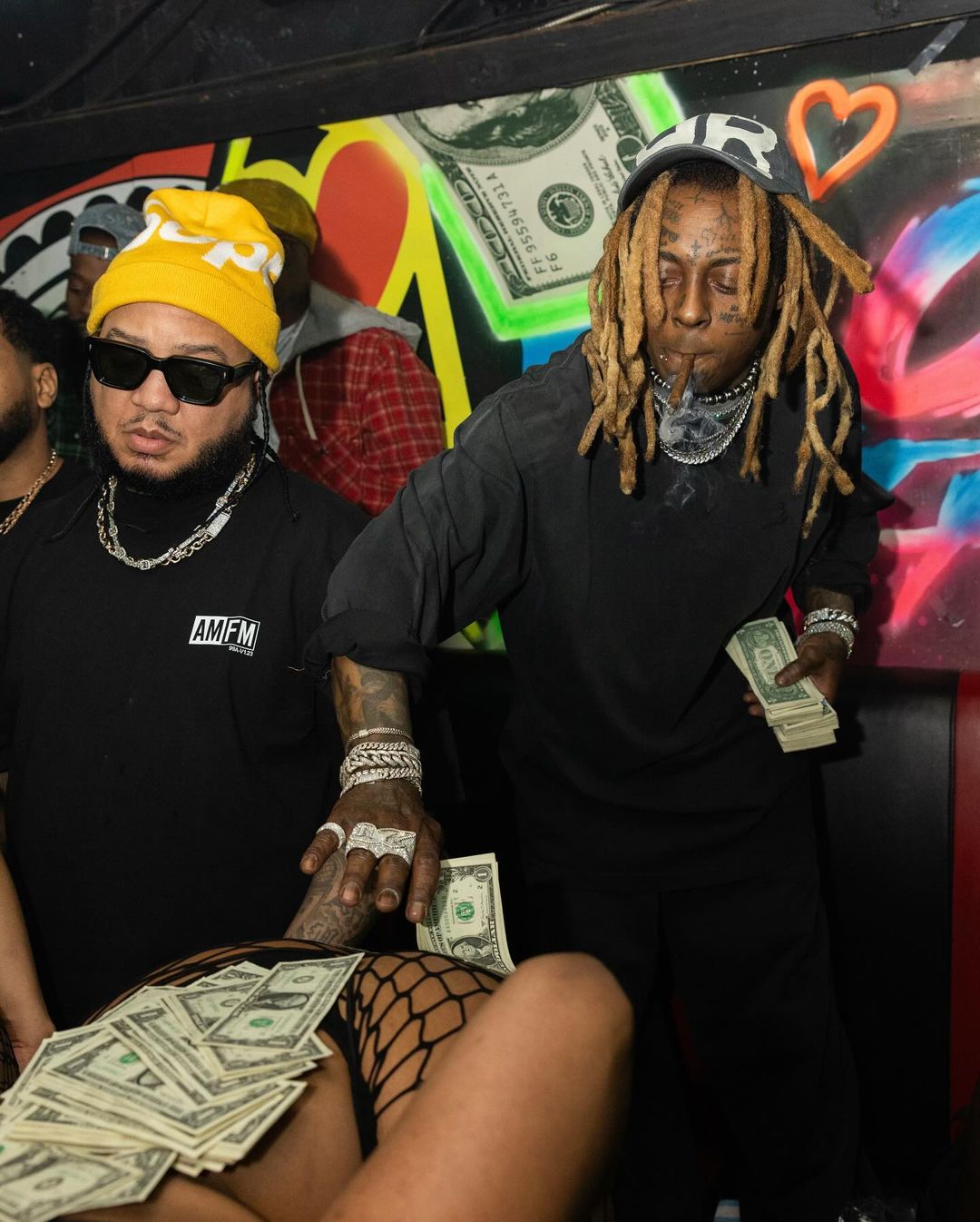 Lil Wayne Makes It Rain At Booby Trap On The River In Miami