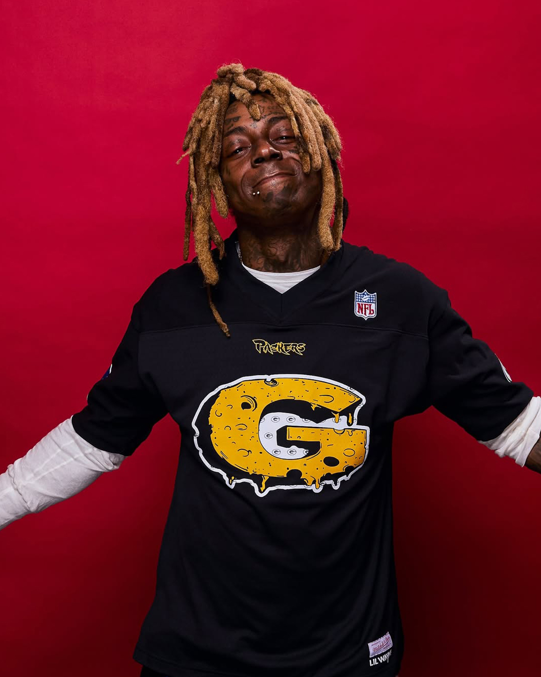 Lil Wayne Collabs With NFL + Mitchell & Ness For Tha Carter VI-Inspired Packers Collection