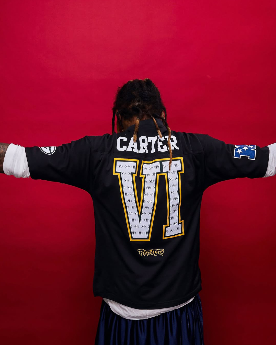 Lil Wayne Collabs With NFL + Mitchell & Ness For Tha Carter VI-Inspired Packers Collection