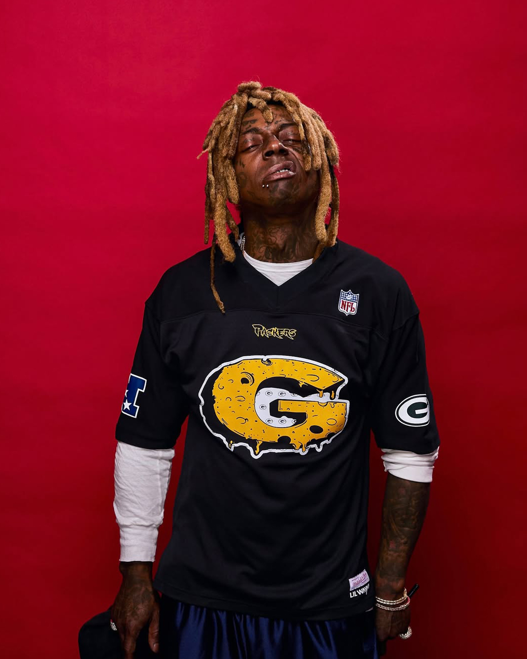 Lil Wayne Collabs With NFL + Mitchell & Ness For Tha Carter VI-Inspired Packers Collection