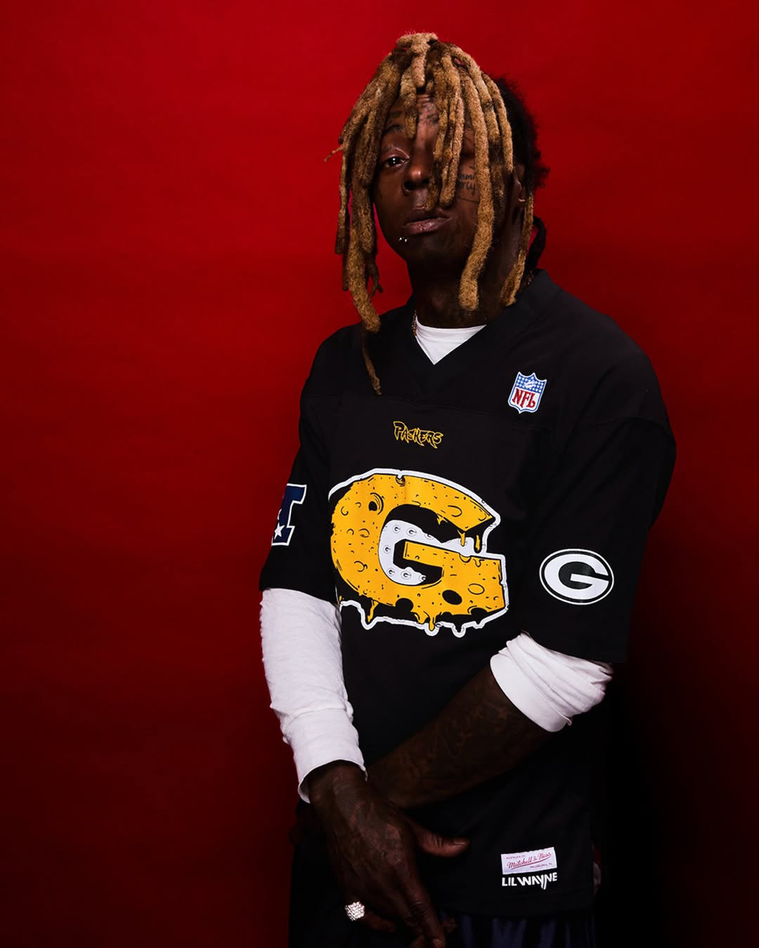 Lil Wayne Collabs With NFL + Mitchell & Ness For Tha Carter VI-Inspired Packers Collection