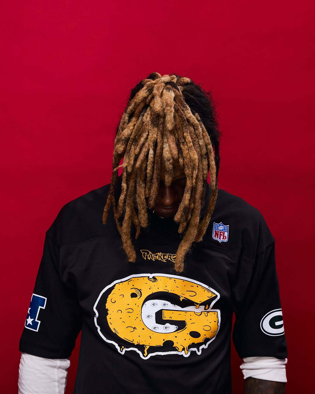 Lil Wayne Collabs With NFL + Mitchell & Ness For Tha Carter VI-Inspired Packers Collection