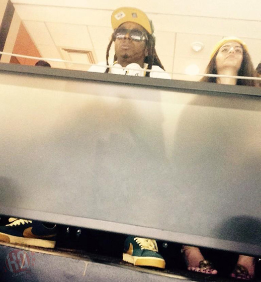 Lil Wayne Attends The Green Bay Packers vs New Orleans Saints NFL Game