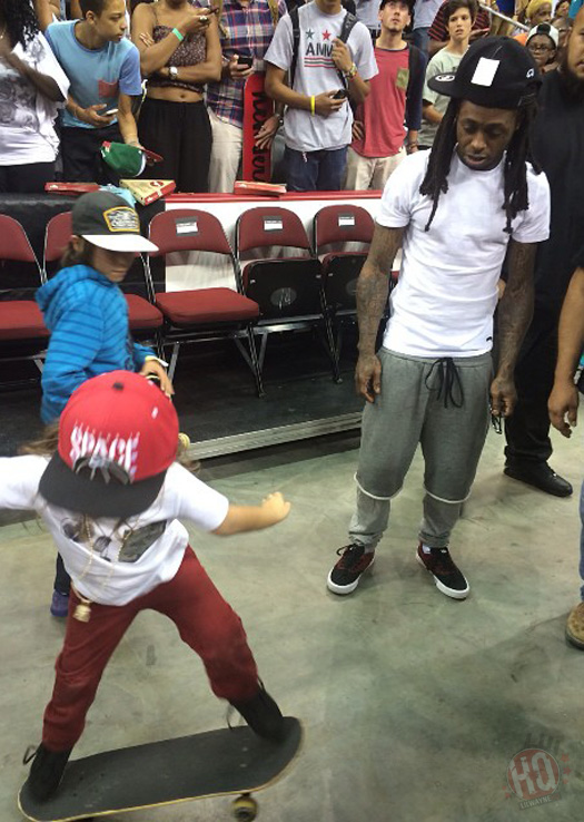 Lil Wayne Skips 2014 MTV VMAs, Attends SLS Championship With Christina Milian