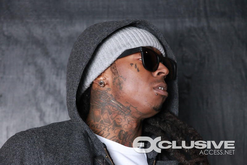 Picture Of Lil Waynes Gun Tattoo On His Neck