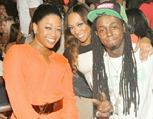 Trina and Lil Wayne together at LIV Nightclub